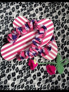 Pink Striped Flip Flops with Multicolor Crochet Straps and Flower Charm.